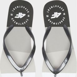 Japonki damskie. Klapki damskie w paski, z gumy, bez obcasa. W wyprzedaży za 24,99 zł.
