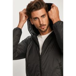 Calvin Klein Jeans - Kurtka. Czarne płaszcze męskie Calvin Klein Jeans, s, bez wzorów, z elastanu, krótkie, z kapturem. Za 849,90 zł.
