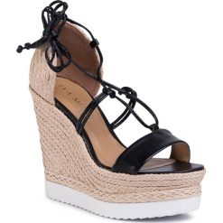 Espadryle EVA MINGE - EM-44-07-000542 644. Czarne espadryle damskie Eva Minge, bez wzorów, ze skóry, bez obcasa, na obcasie. W wyprzedaży za 319,00 zł.