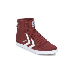 Buty Hummel STADIL CANEVAS HIGH. Czerwone trampki i tenisówki damskie Hummel, bez wzorów, bez zapięcia. Za 262,70 zł.