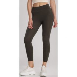 Khaki Legginsy Nealiria. Brązowe legginsy damskie Renee, s, bez wzorów. Za 59,99 zł.