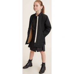 Mango Kids - Kurtka dziecięca Eline 110-164 cm. Czarne kurtki dziewczęce Mango Kids, z bawełny. W wyprzedaży za 69,90 zł.