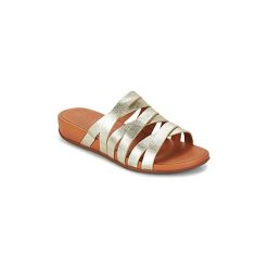Klapki FitFlop LUMY LEATHER SLIDE. Żółte klapki damskie marki FitFlop, bez wzorów, bez obcasa. Za 511,20 zł.