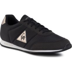 Sneakersy LE COQ SPORTIF - Racerone W Sport 1920284 Black/Champagne. Czarne półbuty damskie le coq sportif, bez wzorów, ze skóry ekologicznej, sportowe, bez obcasa, na płaskiej podeszwie, bez zapięcia. W wyprzedaży za 209,00 zł.
