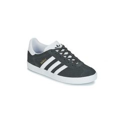 Buty Dziecko adidas GAZELLE J. Czarne trampki dziewczęce Adidas, bez wzorów, bez zapięcia. Za 289,94 zł.