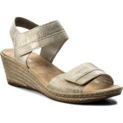 Sandały RIEKER - 62470-90 Gold. Żółte klapki damskie marki Rieker, bez wzorów, ze skóry ekologicznej, bez obcasa, na obcasie. Za 219,00 zł.