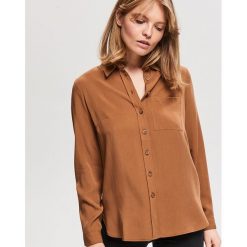 Gladka koszula z Tencelu - Żółty. Żółte koszule damskie Reserved, bez wzorów, bez kołnierzyka, bez rękawów. Za 69,99 zł.