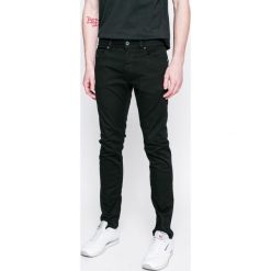 Diesel - Jeansy Thommer. Czarne jeansy męskie Diesel, bez wzorów. Za 599,90 zł.