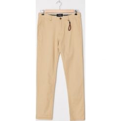 Spodnie chino slim - Beżowy. Brązowe spodnie męskie House, s, bez wzorów. Za 119,99 zł.
