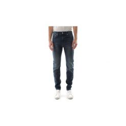 Jeansy slim fit Calvin Klein Jeans J30J308319 SLIM WEST. Niebieskie jeansy męskie Calvin Klein Jeans, m, bez wzorów. Za 400,35 zł.