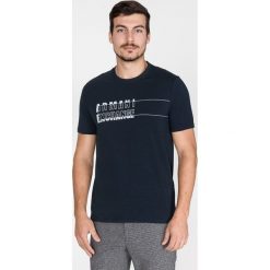 Armani Exchange Koszulka Niebieski. Niebieskie koszulki męskie Armani Exchange, l, z nadrukiem, z elastanu, bez kołnierzyka, krótkie. Za 292,95 zł.