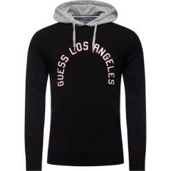 Bluza Guess M93Q32 K6ZS0. Czarne bluzy męskie Guess, xxl, z aplikacjami, z elastanu, bez kołnierzyka, bez rękawów, bez kaptura. W wyprzedaży za 189,00 zł.