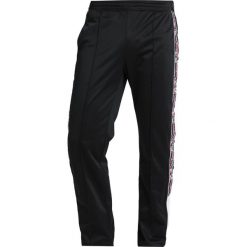 Champion Reverse Weave SPECIAL SEMI DULL Spodnie treningowe black. Czarne spodnie dresowe męskie marki Champion Reverse Weave, z dresówki. Za 359,00 zł.