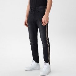 Jeansy slim fit z lampasami - Czarny. Czarne jeansy męskie House, m, bez wzorów. W wyprzedaży za 29,99 zł.