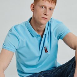 Koszulka polo z haftem - Niebieski. Koszulki męskie Cropp. W wyprzedaży za 19,99 zł.