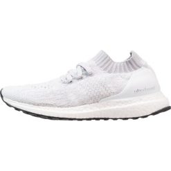 Adidas Performance ULTRABOOST UNCAGED Obuwie do biegania treningowe footwear white/white tint/core black. Białe buty sportowe damskie adidas Performance, z tworzywa sztucznego. W wyprzedaży za 519,20 zł.