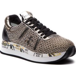 Sneakersy PREMIATA - Conny 2596 Złoty. Żółte półbuty damskie marki Premiata, na co dzień, bez wzorów, ze skóry ekologicznej, bez obcasa, bez zapięcia. W wyprzedaży za 559,00 zł.