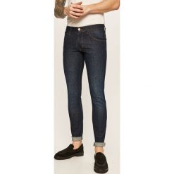 Wrangler - Jeansy Bryson. Niebieskie jeansy męskie Wrangler. Za 329,90 zł.