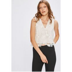 Tommy Hilfiger - Top Penelope. Białe bluzki damskie TOMMY HILFIGER, w koronkowe wzory, z bawełny, casualowe, bez kołnierzyka, bez rękawów. W wyprzedaży za 179,90 zł.