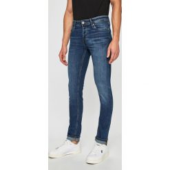 Jack & Jones - Jeansy. Niebieskie jeansy męskie Jack & Jones, z aplikacjami, z obniżonym stanem. W wyprzedaży za 129,90 zł.