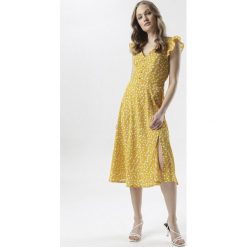 Żółta Sukienka Aeciane. Żółte sukienki damskie Born2be, na imprezę, s, bez wzorów, z tkaniny, retro, bez kołnierzyka, bez rękawów, midi, rozkloszowane. Za 109,99 zł.