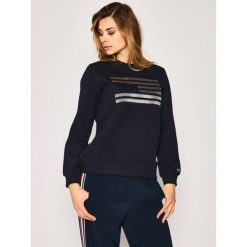 Bluza TOMMY HILFIGER ICONS Relaxed C-Nk WW0WW27841. Niebieskie bluzy damskie TOMMY HILFIGER, m, bez wzorów, z bawełny, bez rękawów, bez kaptura. W wyprzedaży za 429,00 zł.