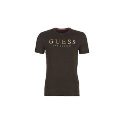 T-shirty z krótkim rękawem Guess SHOWY. Czarne t-shirty męskie Guess, xxl, z aplikacjami, bez kołnierzyka, krótkie. Za 159,00 zł.