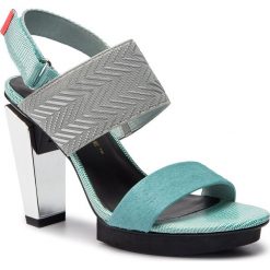 Sandały UNITED NUDE - Lev Sandal Hi 1042259636108 Ice Fire. Niebieskie klapki damskie marki United Nude, bez wzorów, ze skóry, bez obcasa, na obcasie. Za 939,00 zł.