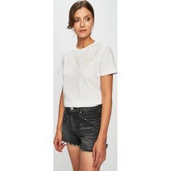 Tommy Hilfiger - Top. Białe bluzki damskie TOMMY HILFIGER, s, z nadrukiem, z bawełny, z okrągłym kołnierzem. W wyprzedaży za 99,90 zł.