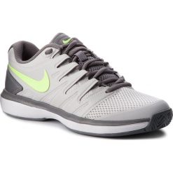 Buty NIKE - Air Zoom Prestige Hc AA8024 070 Vast Grey/Volt Glow-Gunsmoke. Szare buty sportowe męskie Nike, ze skóry ekologicznej, bez zapięcia, tenisowe. W wyprzedaży za 299,00 zł.