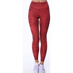 Legginsy sportowe we wzory koralowe MR15285. Pomarańczowe legginsy damskie marki Fasardi, s. Za 59,00 zł.