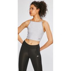 Nike - Top. Szare topy damskie Nike, xs, bez wzorów, z elastanu, bez rękawów, dri-fit (nike). W wyprzedaży za 119,90 zł.