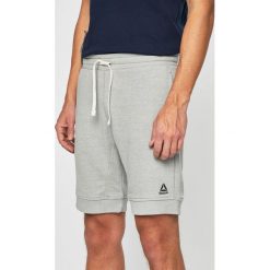 Reebok - Szorty. Szare spodenki sportowe męskie Reebok, m, bez wzorów, z elastanu, sportowe. W wyprzedaży za 139,90 zł.