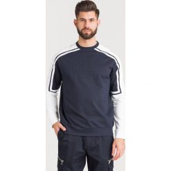 BLUZA Emporio Armani. Białe bluzy męskie Emporio Armani, xl, bez wzorów, z tkaniny, z okrągłym kołnierzem, bez rękawów, bez kaptura. Za 515,00 zł.