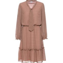 Sukienka z nadrukiem bonprix w graficzny wzór. Pomarańczowe sukienki damskie bonprix, z nadrukiem, bez kołnierzyka, bez rękawów. Za 149,99 zł.