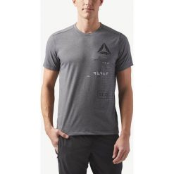 Reebok Koszulka Szary. Szare podkoszulki męskie Reebok, s, bez wzorów, z bawełny, sportowe, bez kołnierzyka, krótkie. Za 163,95 zł.