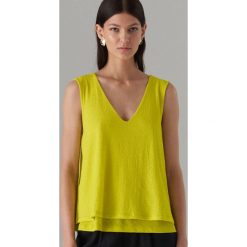 Top oversize - Żółty. Żółte topy damskie Mohito, s, bez wzorów, bez kołnierzyka. W wyprzedaży za 29,99 zł.