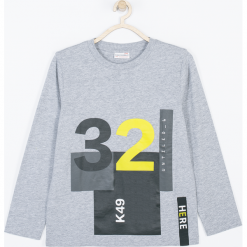 Koszulka. Szare t-shirty chłopięce NOWHERE NOW HERE, z aplikacjami, z bawełny, z długim rękawem. Za 35,90 zł.