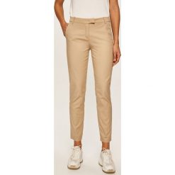 Marc O'Polo - Spodnie. Brązowe spodnie damskie Marc O'Polo, z elastanu. Za 429,90 zł.
