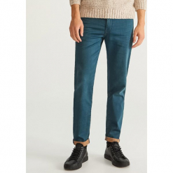 Jeansy slim fit dzianinowe - Turkusowy. Niebieskie jeansy męskie slim marki Reserved. Za 149,99 zł.