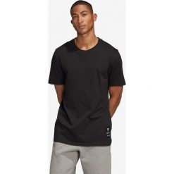 Adidas Originals Trefoil Evolution Koszulka Czarny. Czarne podkoszulki męskie adidas Originals, l, z nadrukiem, z bawełny, z krótkim rękawem. Za 145,95 zł.