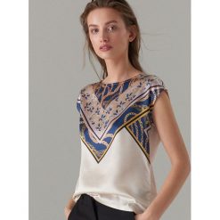 Bluzka z motywem chain print - Kremowy. Białe bluzki damskie Mohito, s, bez wzorów, bez kołnierzyka, bez rękawów. Za 39,99 zł.