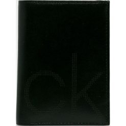Calvin Klein - Portfel skórzany. Czarne portfele męskie marki Calvin Klein, z materiału. Za 299,90 zł.
