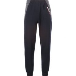 Granatowe Spodnie Yrelrya. Niebieskie spodnie męskie Born2be, xl, bez wzorów, z dresówki. Za 49,99 zł.