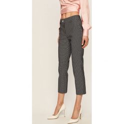 Guess Jeans - Spodnie. Niebieskie legginsy damskie Guess Jeans, s, z aplikacjami, z bawełny. Za 469,90 zł.