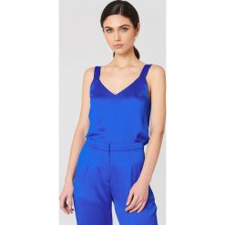 Rut&Circle Top na ramiączkach Ginny - Blue. Niebieskie topy damskie Rut&Circle, bez wzorów, z poliesteru, bez kołnierzyka. W wyprzedaży za 60,97 zł.
