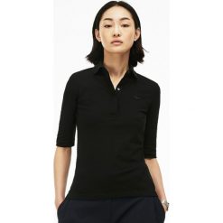Lacoste SLIM FIT PF7844 Koszulka polo noir. Czarne koszulki damskie marki Lacoste, bez wzorów, z elastanu, polo, bez rękawów. Za 419,00 zł.