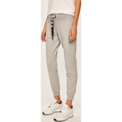 Dkny - Spodnie. Niebieskie spodnie damskie DKNY, s, z bawełny. Za 299,90 zł.