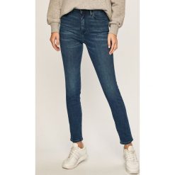 Tommy Hilfiger - Jeansy. Niebieskie jeansy damskie TOMMY HILFIGER, m, z podwyższonym stanem. Za 499,90 zł.