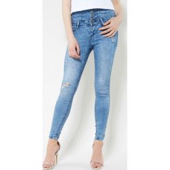Jeansy damskie: Niebieskie Jeansy Secret Back